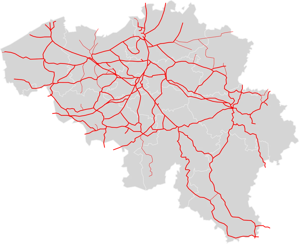 Mapa de Bélgica con red ferroviaria en rojo y límites provinciales sobre fondo gris